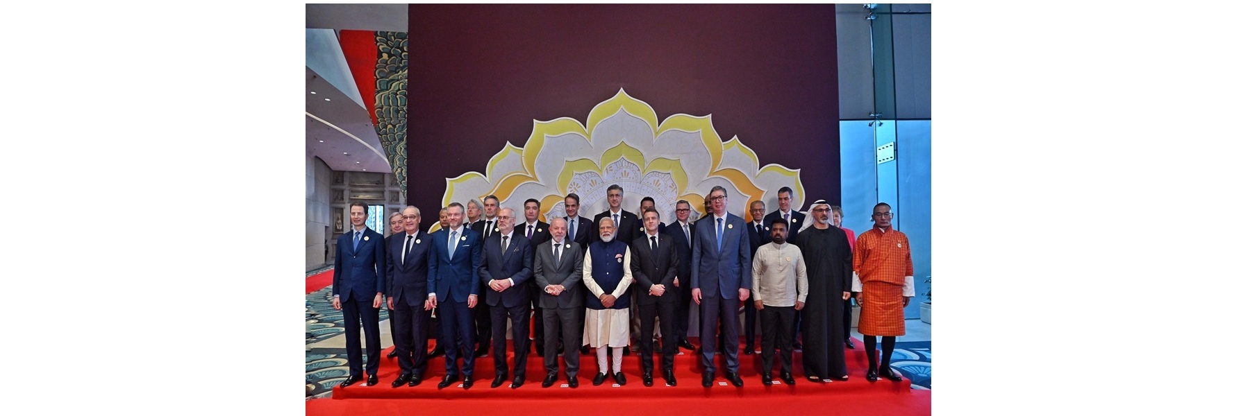 PM in a group family photograph along with global world leaders at the Opening Ceremony of India AI Impact Summit – 2026 at Bharat Mandapam, in New Delhi