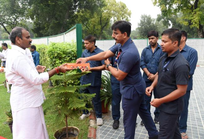 The Minister of State for Information and Broadcasting and Parliamentary Affairs, Dr. L. Murugan hoisting the National Flag at his residence in New Delhi on the occasion of 79th Independence Day on August 15, 2025.