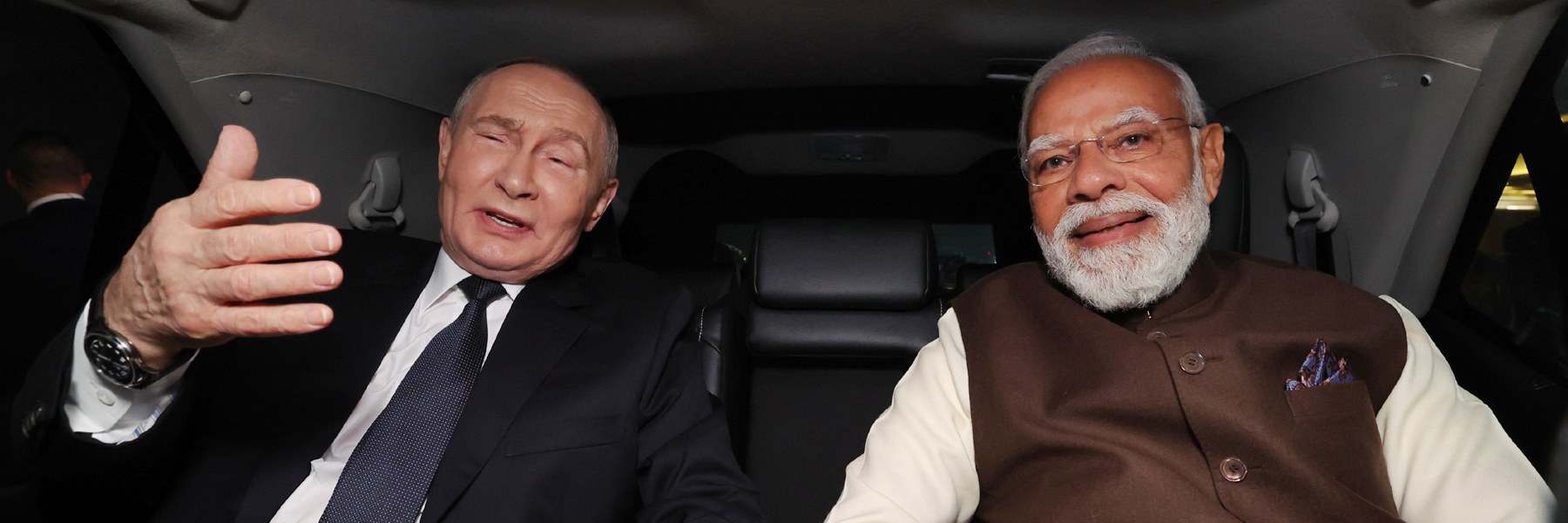 PM and President of Russian Federation, Mr. Vladimir Putin travel in the same car, as they depart from the Airport, in New Delhi