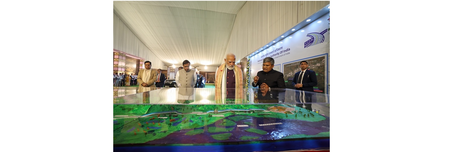PM reviews the model of Kaziranga Elevated Corridor, in Assam.