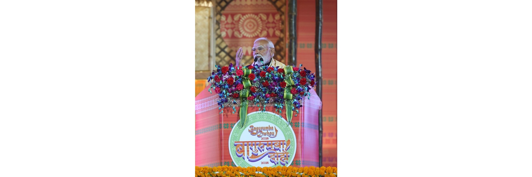 PM addressing the gathering during the “Bagurumba Dwhou 2026”, a historic cultural event celebrating the rich heritage of the Bodo community at Sarusajai stadium (Guwahati), in Assam 